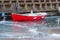 Red boat in frozen Copenhagen canal - winter season