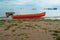 A red boat was on the shore in Dili Timor Leste