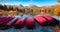 Red boats on the pier. Colorful autumn scene of Strbske pleso lake. Panoramic morning view of High Tatras National Park, Slovakia,