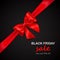 Red bow with diagonally ribbon and inscription Black Friday Sale