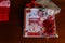 Red boxes and red greeting card with reindeer. Winter decoration