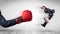 Red boxing glove knocks out little businessman