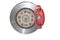 A red brake caliper mounted on the car`s brake disc on a white background. Isolate