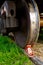 Red brake shoe under the wheel of a freight car on the siding