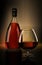 Red Brandy whiskey Cognac Bottle with Glass mockup