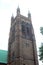 Red brick basilica with tower Four small pinnacles St Andrew s Anglican Church