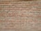 Red brick block wall show Pattern stack block rough surface texture material background Weld the joints with cement grout red