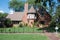 Red Brick English Tudor House with Round Turret