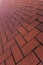 Red brick floor paving clinker brick in imperial format texture. Herringbone Brick clinker textures.