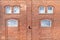 Red brick house facade background texture