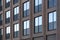 Red brick loft building with large Windows