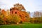 The red brick tower of the Fedorovsky town in the autumn in Tsar