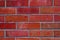 Red brick wall background can be used in many situations