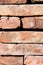 Red brick wall background with copy space. Used Rustic Bricks Piled.