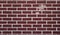 Red brick wall background style decor grunge, peeling paint and moldy.