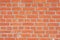 Red brick wall close perspective