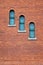 Red brick wall round arch windows with stone traditional gothic background