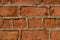 Red brick wall texture grunge background , may use to interior design.