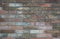 Red brick wall texture grunge background with vignetted corners