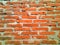 Red bricks that form a wall