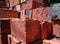 red bricks neatly arranged in the sun