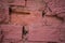 Red Bricks on Rough Wall. Not Properly Sealed with Mortar Creating Irregular Gaps in Between. Messy Adobe Installatio