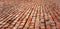 Red bricks surface horizontal background with perspective effect, background