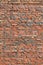 Red bricks wall texture and background. Vertical frame