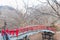 A red bridge in Ikaho Onsen on autumn is a hot spring town located on the eastern slopes of Mount Haruna , famous place of Gun