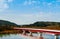 Red bridge over Urauchi river and mangrove forest in - Iriomote