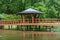 Red bridge with a view pavilion, yumedono bashi, in japanese gar