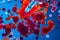 Red bubbles of blood cells on blue background. Abstraction of medicine. Micro processes and diseases in the human body