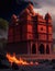 A red building with domes and a fire