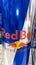 Red Bull logo brand and text sign Energy Drink on big advertising can in market shop