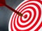 Red bullseye dart arrow hitting target center of dartboard. Concept of success, target, goal, achievement