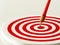 Red bullseye dart arrow hitting target center of dartboard. Concept of success, target, goal, achievement.