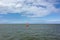 A Red Buoy on the North Sea in the East Frisian Wadden Sea in front of Juist Island, Germany