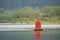 Red buoy - protects underwater obstacles and shows the border of the ship's passage from the right Bank
