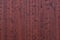 Red burgundy wooden texture background. Large wall surface