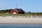 Red cabin on the beach of Birds island