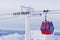 Red cable car in a ski resort in the Alps. Red gondola funicular in a ski resort, sweden, frosty sunny day