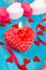 Red candle, hearts and rinbons