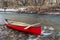 Red canoe on a river