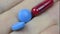 Red capsules and blue tablets in macro view