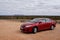 Red Car and Mt Connor in Outback Australia