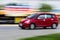 Red car Speeding in road