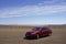 Red Car on Stuart Highway in Outback Australia