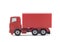 Red cargo delivery truck miniature isolated on white background