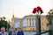 Red carnations in a gun cartridge on a light Soviet tank T-38 in