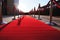 red carpet being rolled out for high-profile gala event